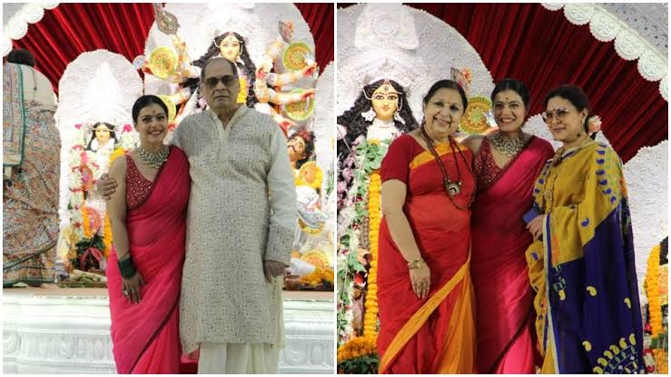 Kajol looks all graceful in a red Silk Saree which she opted for the Durga Puja