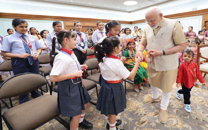 PM celebrates Raksha Bandhan with children