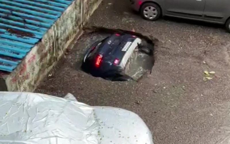 Watch a terrifying video of how a car swept into ground in Mumbai after heavy rainfall