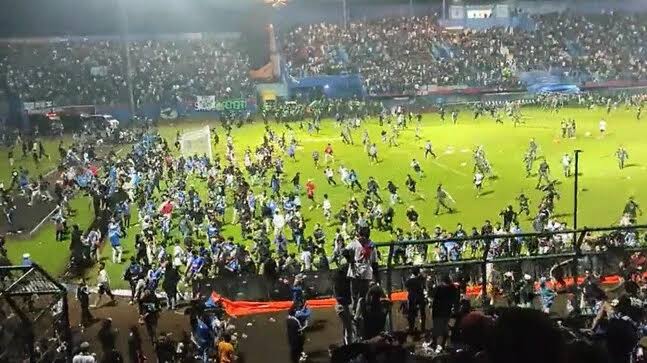 127 killed in stampede after violence during football match in Indonesia