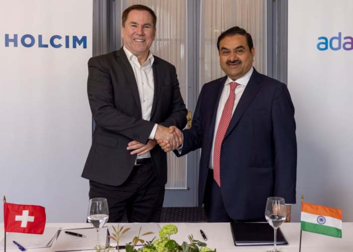 Business News : Adani Group buys Ambuja and ACC Cement business