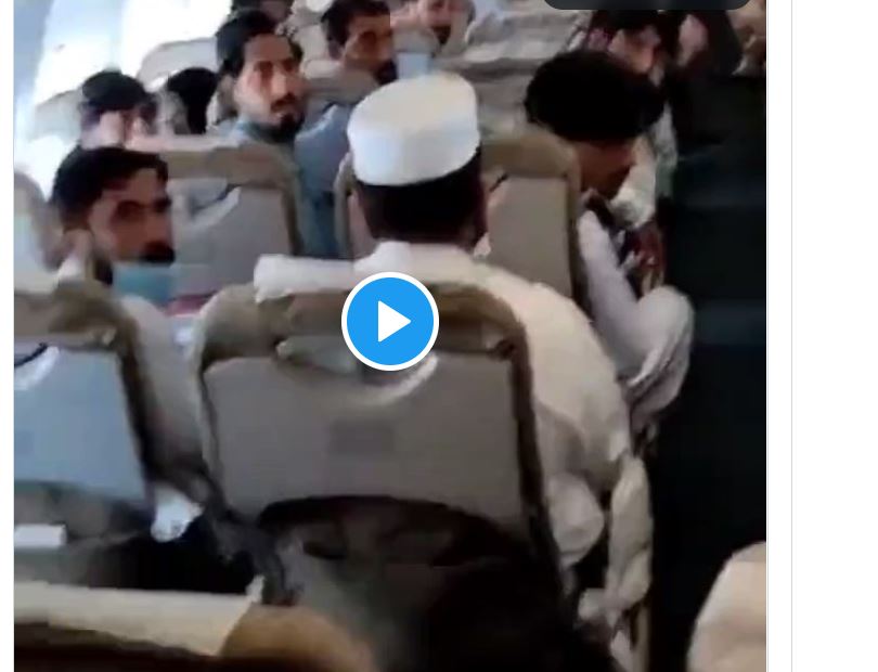 Pakistan Flight Viral Video - Pakistani Man Tried to Break Flight Window Mid-Air - Watch Here