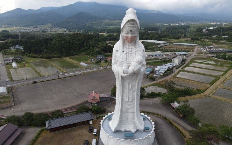 Japan dons face mask to GIant Buddhist goddess to pray for end of COVID-19 outbreak