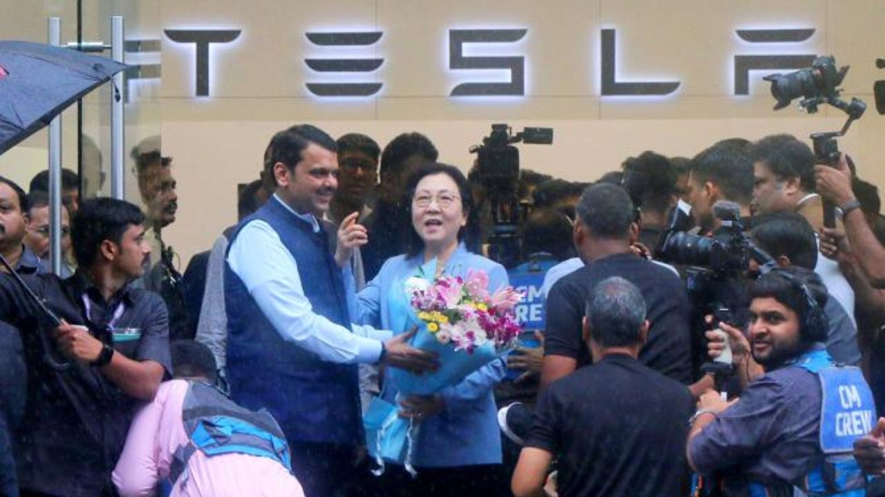 Maharashtra CM Fadnavis visits Tesla showroom in Mumbai ahead of inauguration
