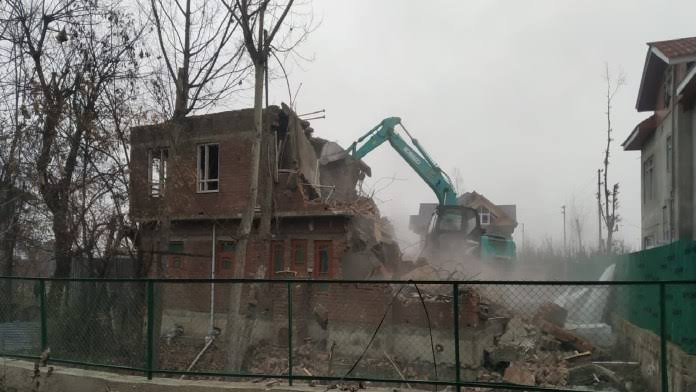 Bulldozer on terrorist's house in Kashmir, wall demolished in Kashmir 