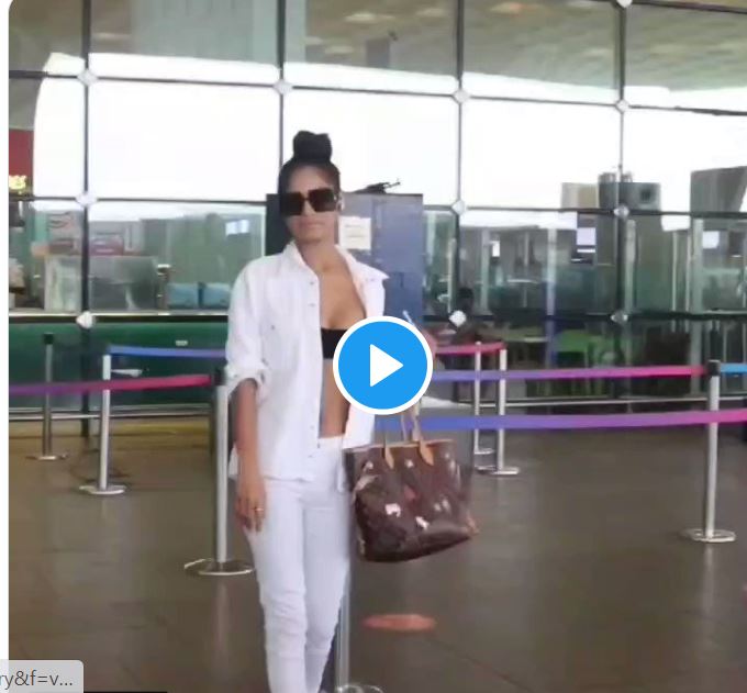 Poonam Pandey Boldest Avatar Viral Video Unbuttons Shirt to show Black Bralette on Airport - Watch Video