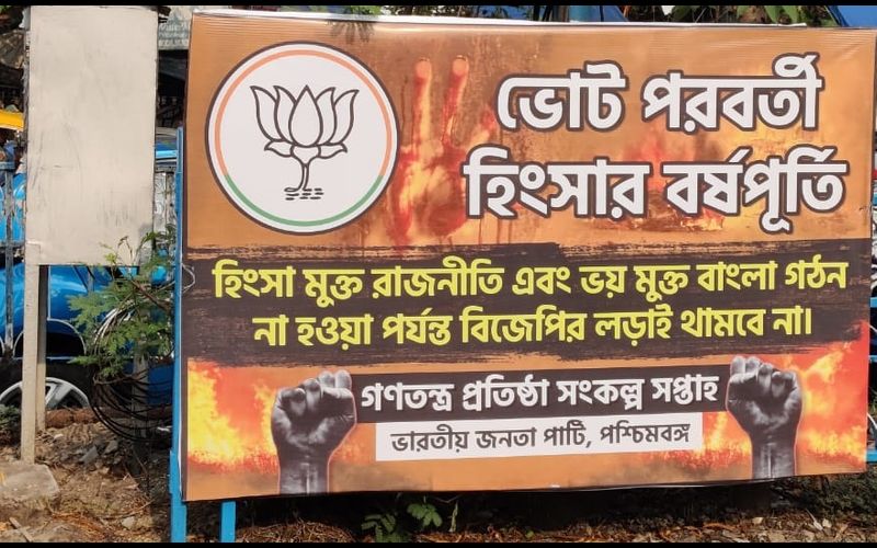 Bengal Violence: BJP puts up posters in Dharmatala, Kolkata marking the one year of Post-Poll violence in the state. 