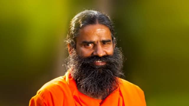 Ramdev threatens Reporter, asks him to Shut up when asked about “Petrol at Rs 40 if BJP came to Power in 2014”